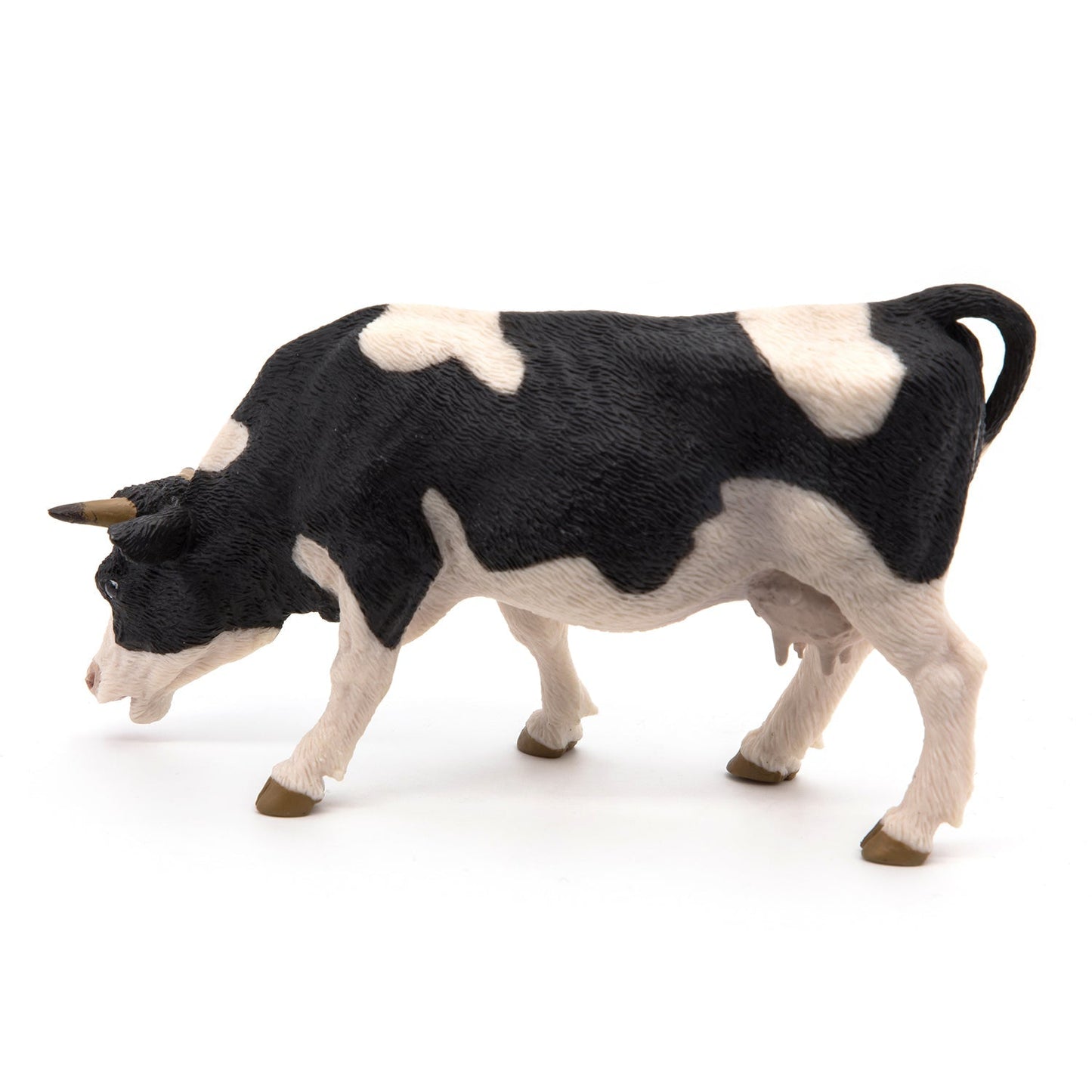 Figurine Vache noire et blanche broutant