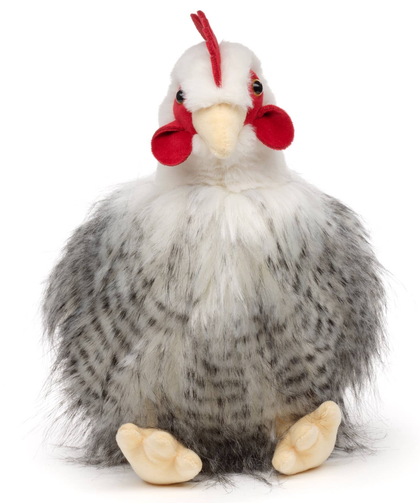Stofftier Huhn sitzend mit Ei