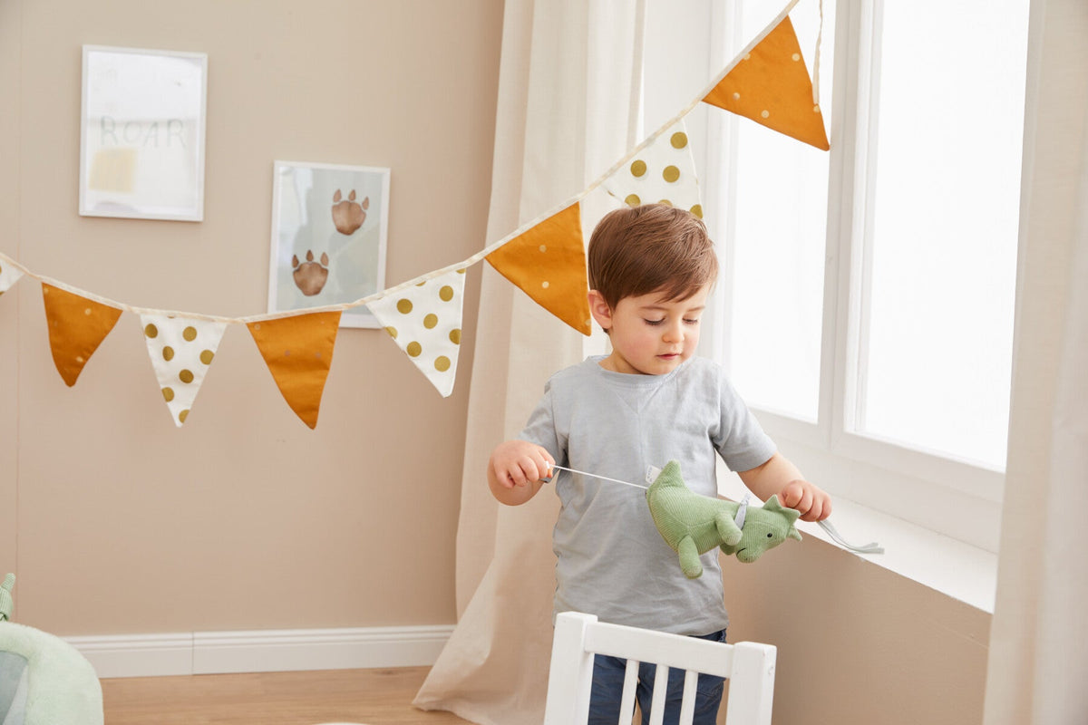 Peluche musicale Dino Rexi S – mise en situation