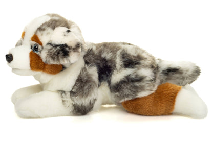 Peluche Berger australien couché