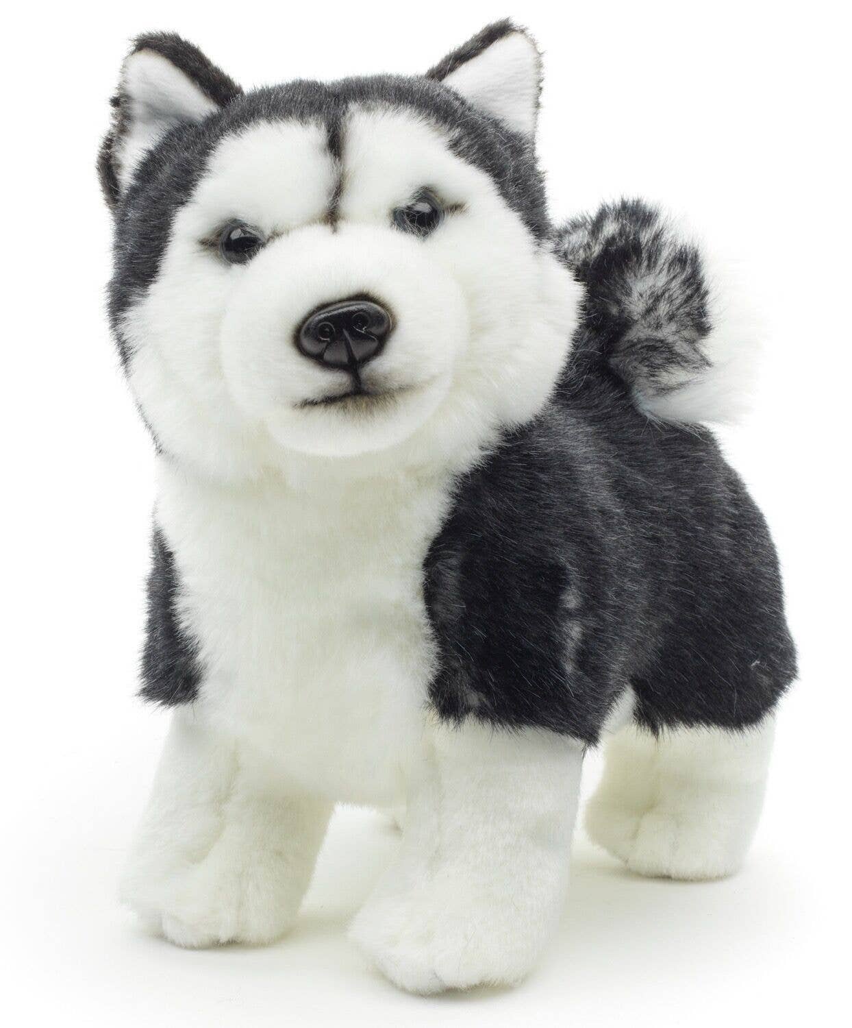 Stehendes Plüschtier eines schwarzen Huskywelpen