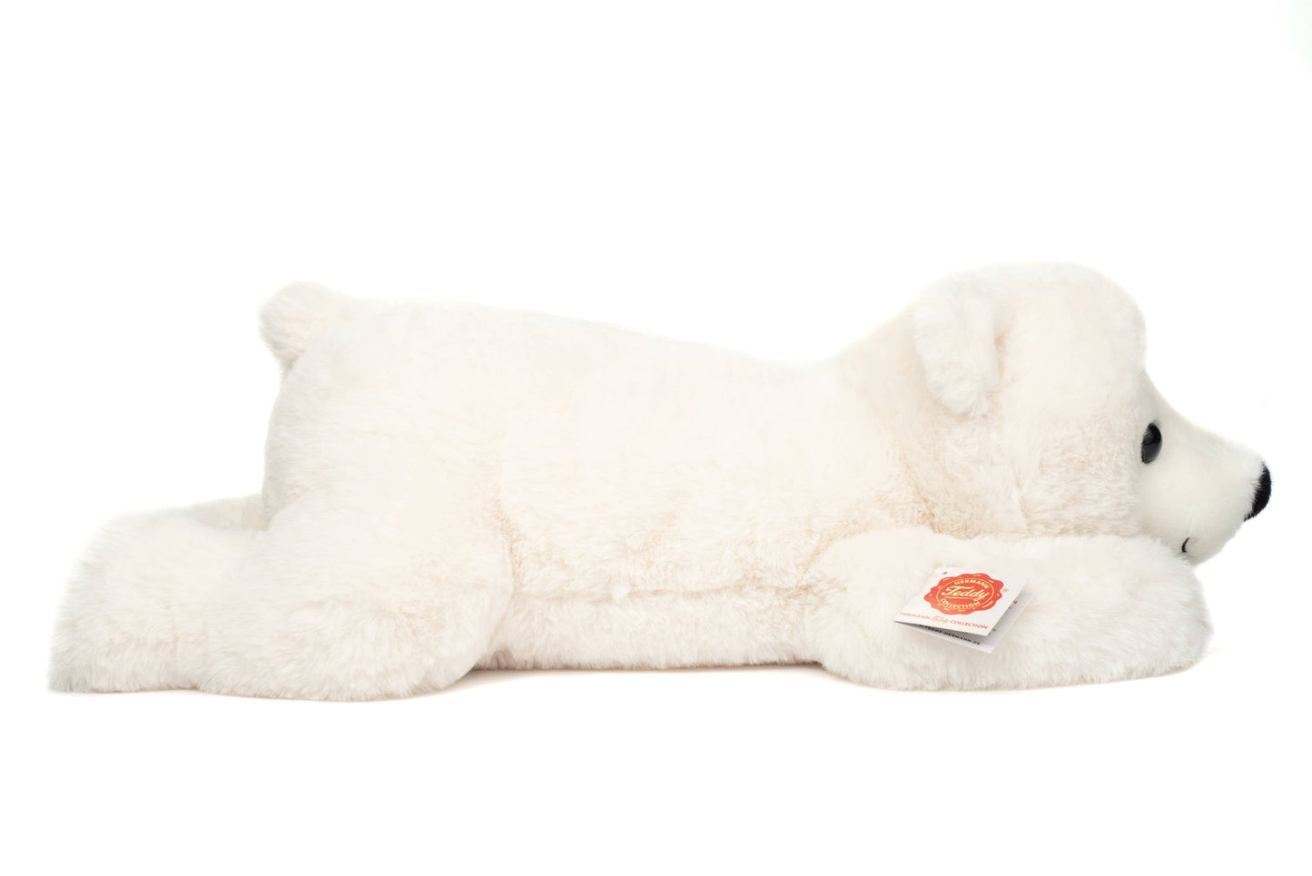 Polar bear plush lying down