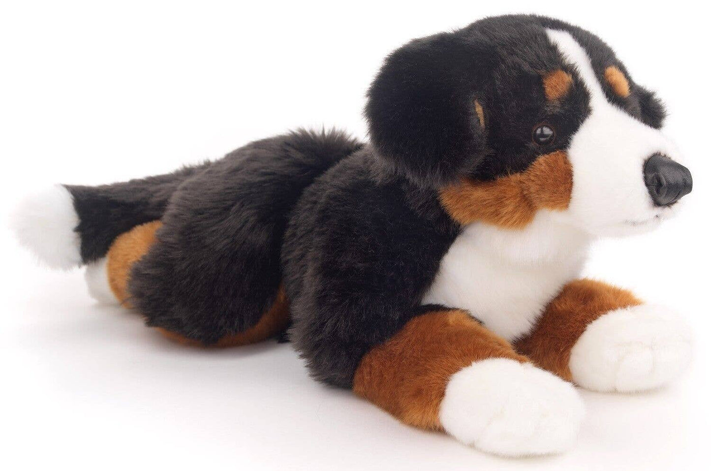 Plüschtier eines Berner Sennenhundes, liegend