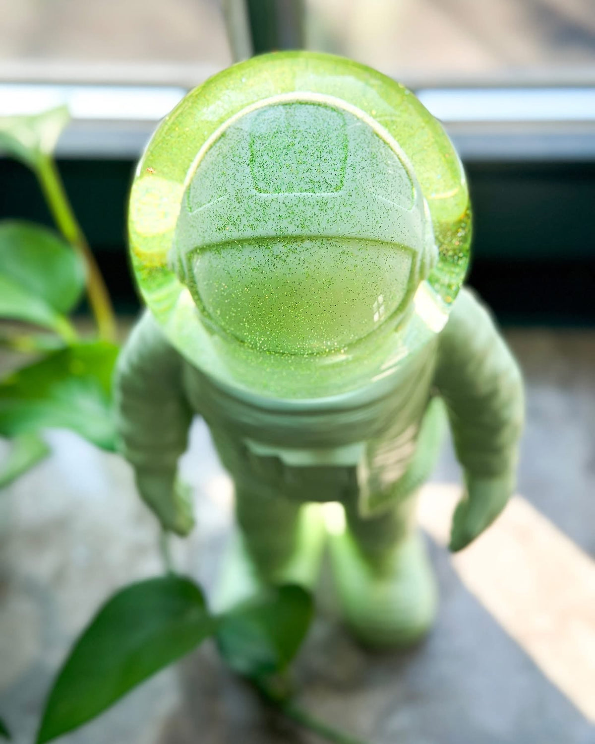Giant Green Astronaut Snow Globe