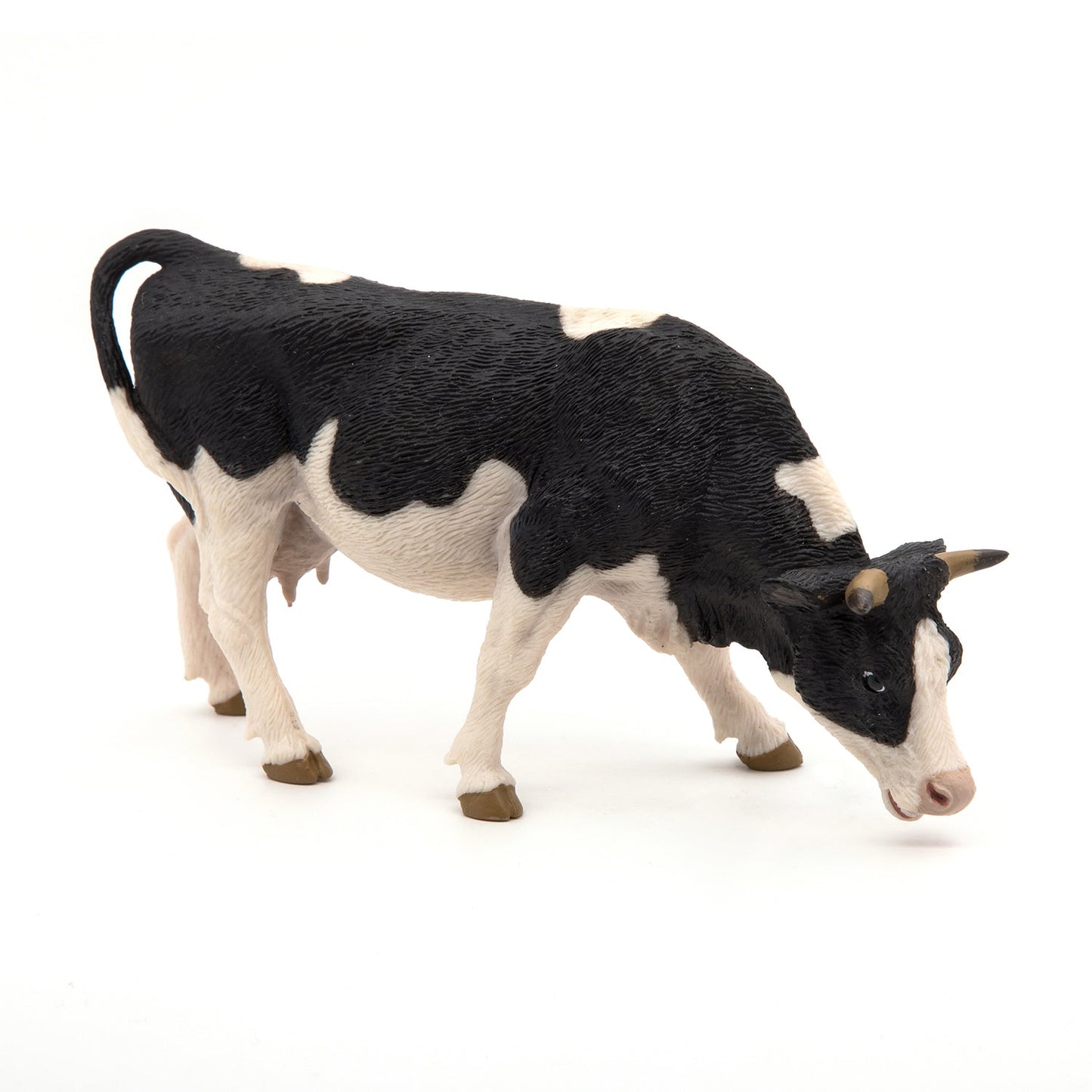 Figurine Vache noire et blanche broutant