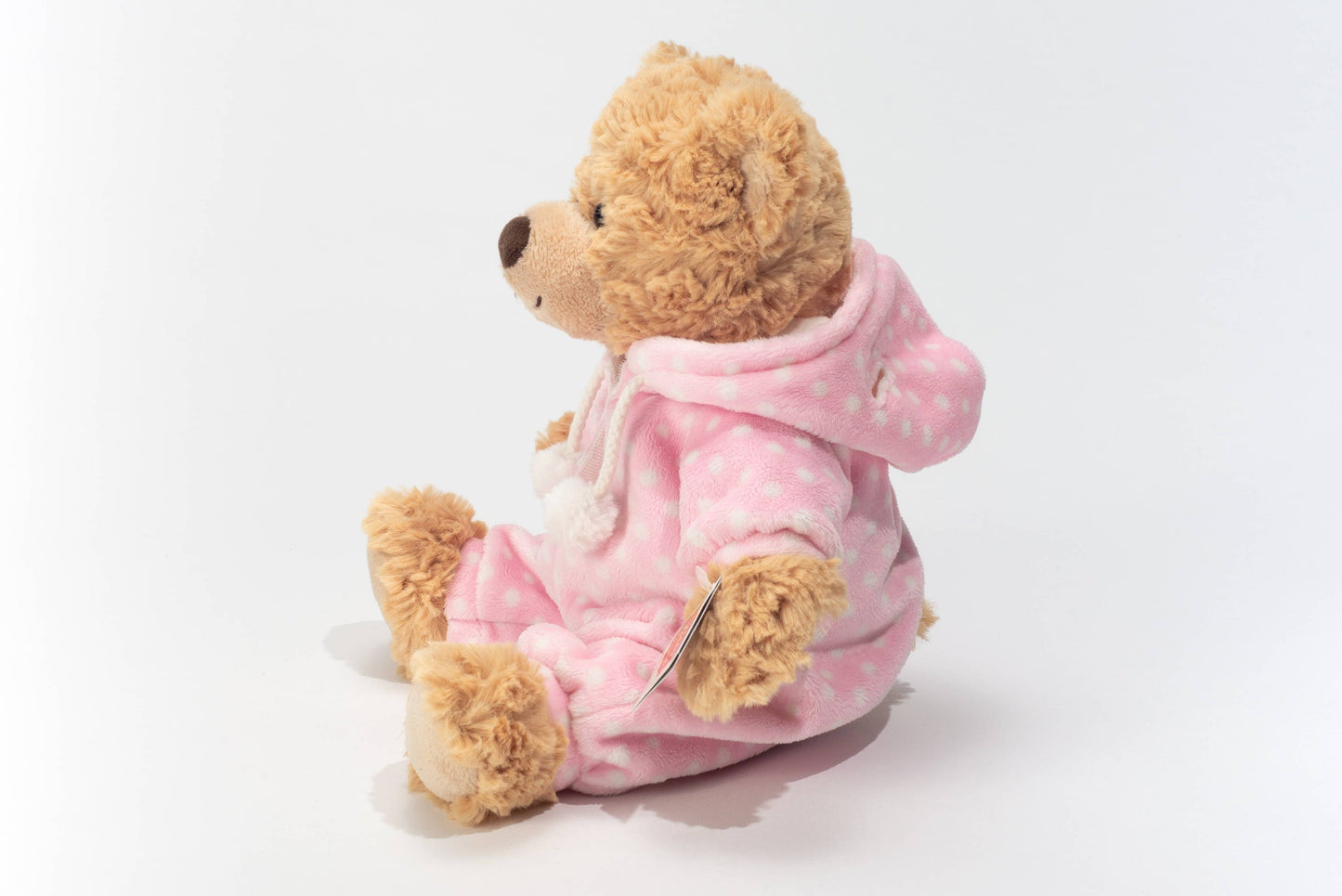 Plüschteddybär im rosa Pyjama