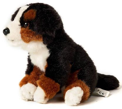 Plüsch-Berner Sennenhundwelpe, sitzend