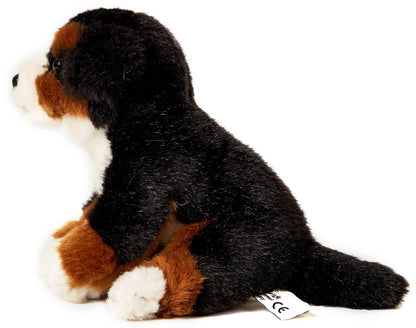 Plüsch-Berner Sennenhundwelpe, sitzend