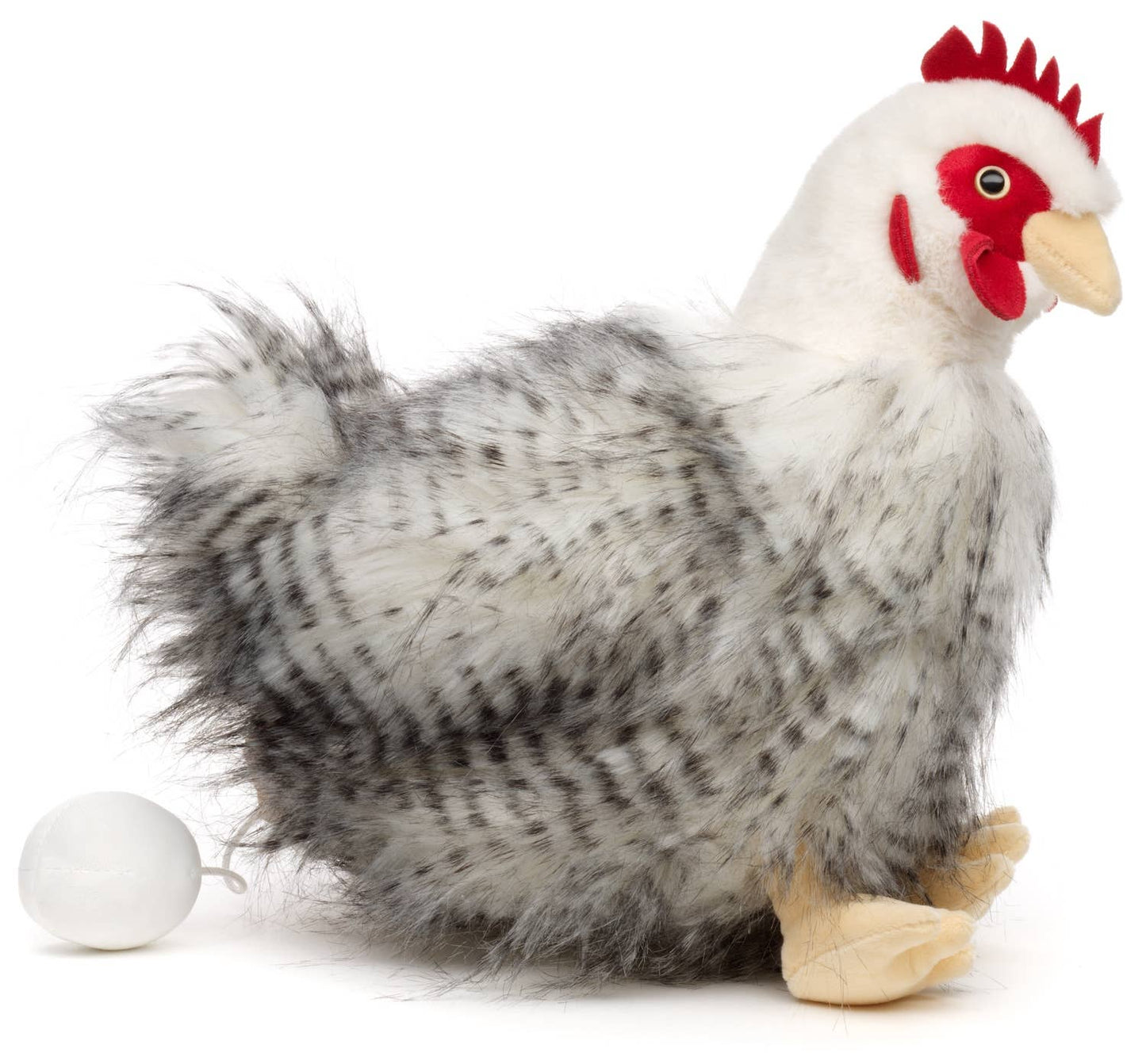 Stofftier Huhn sitzend mit Ei